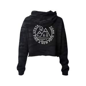 Find a new path in our original design "Find A New Path" cropped hoodie. Printed in white ink on the front and back of a black camouflage-patterned cropped hooded sweatshirt.  Only Found at 518 Prints