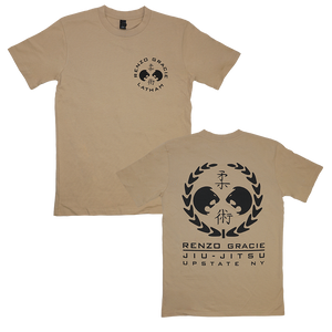 Renzo Gracie Latham's "Upstate Laurel" design, printed on the front and back of a tan AS Colour tee.  Tee features include relaxed fit; crew neck; heavy weight, 6.5 oz, 22-singles; 100% combed cotton; neck ribbing; side-seamed; shoulder to shoulder tape; double-needle hems; preshrunk to minimize shrinkage.