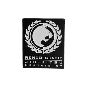Renzo Gracie Latham "Upstate Lion Laurel" design, rendered as an enamel pin.