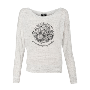 Grow where you're planted - and show off your resilient spirit in our comfortable flowy long sleeve. Custom design, printed in black on the front of a white marble colored shirt.  Only found at 518 Prints