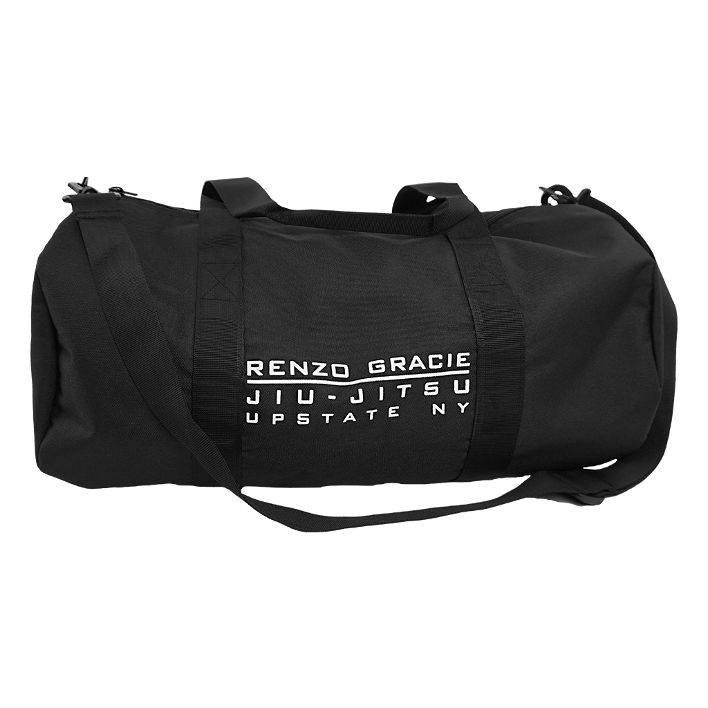 Renzo Gracie Latham's "Upstate Stack Logo" design, printed on the side of a black Independent brand duffel bag.  Bag features include 100% polyester fabric, waterproof interior PVC coating, zipped mesh pocket (5.5” height, 8.25” width) on inside, carrying handles, and removable shoulder strap. Bag measures 20.5” x 10.5”.