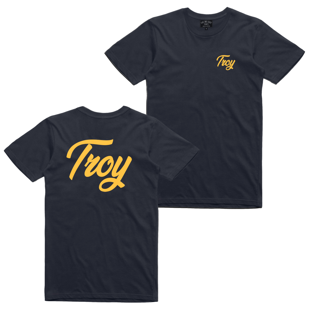 Simple and clean, our "Simple Script" tee features the word Troy in gold script on the front and back of a navy blue tee.  Only found at 518 Prints