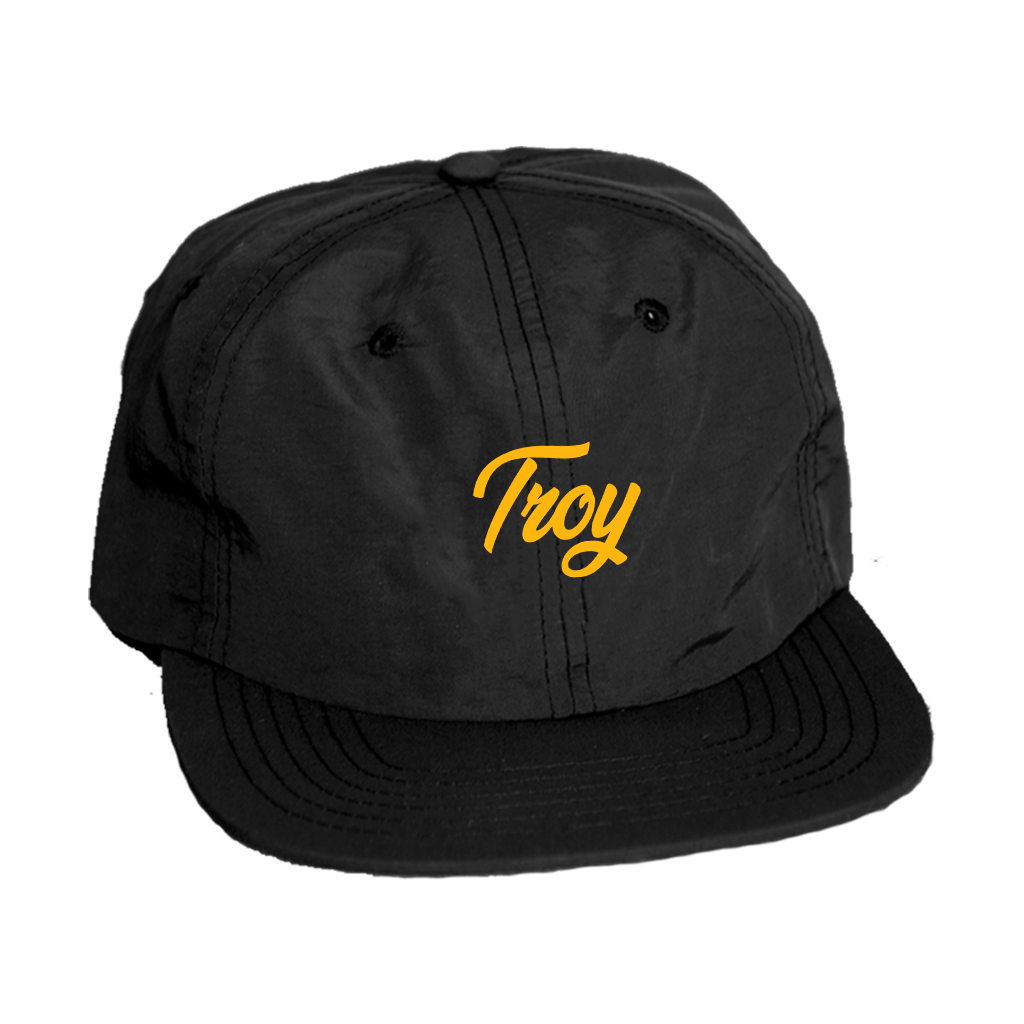 Keep your noggin dry in our custom-embroidered Troy simple script cap. Design is embroidered in gold on the front of a black nylon adjustable cap.  Only found at 518 Prints