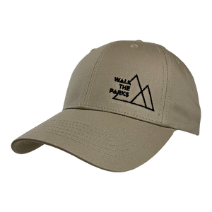 Walk The Parks's logo embroidered in black on the front of a khaki adjustable structured cotton twill cap.  Cap features include 100% cotton twill fabric; structured, 6-panel, low-profile construction; front panel constructed with buckram, and a matching hook and loop closure.